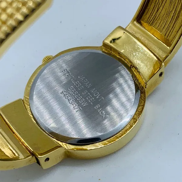 Ladies Quartz analog 30mm gold tone cuff bracelet watch white dial size 7” runs - Image 6
