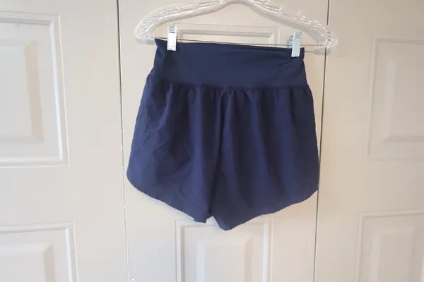 Bundle of XS's and smalls exercise workout shorts in black and navy blue. - Image 4
