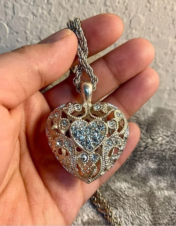 Silver colored heart locket necklace filled with rhinestones in the front side - Image 5