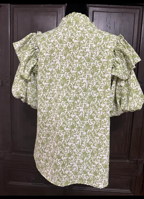 Green & white floral Boho Blouse with ruffled Puff sleeves- Size Medium. ***Refer to measurements. Gently warn and excellent condition. Measurements approximately 21” x 24” long. Material is 100% polyester. Non-smoking home . Priced at as is condition. Don’t like my price make a reasonable offer! And thank you for checking my closet! - Image 2