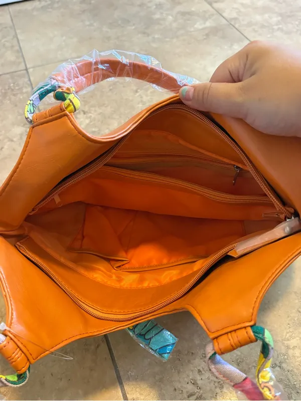 Orange Leather Shoulder Bag with Colorful Scarf Accent - Image 2