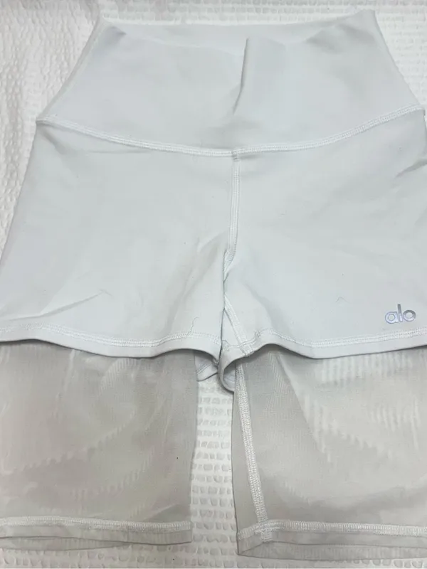 Alo High-Waist White Bike Shorts with Overlay - Image 3