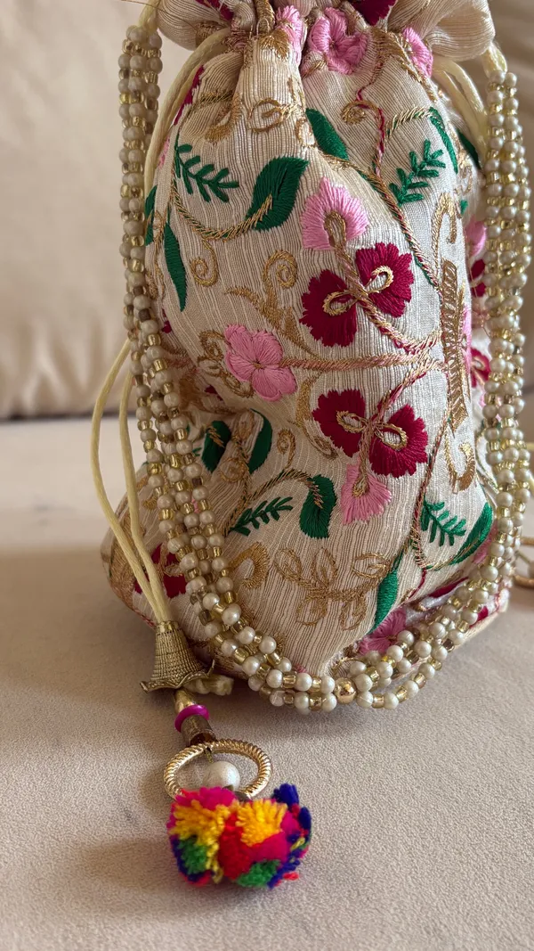 Handmade embroidered floral drawstring bag with pink, red, and green flowers and gold accents. #handmade #embroidered - Image 3
