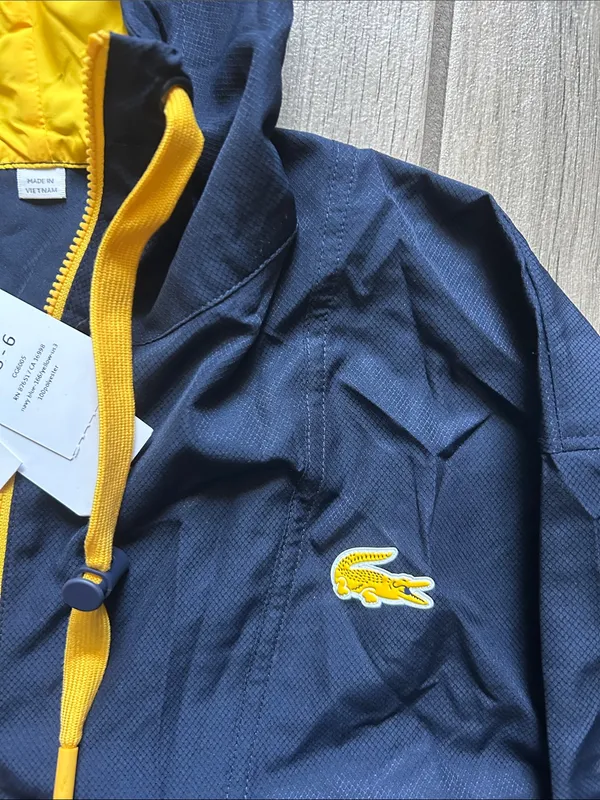 Lacoste Navy Windbreaker with Yellow Accents - Image 3