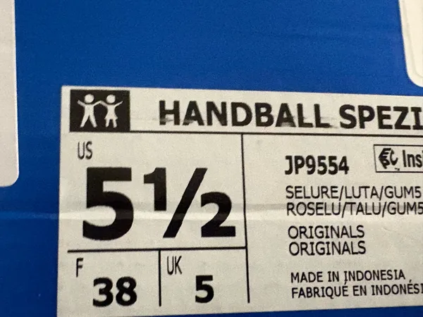 Adidas handball poles in a pretty red with light orange stripes - Image 8