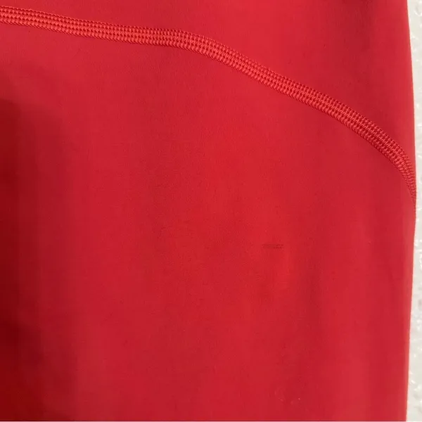 Vuori Women's Orange stride ziper pocket Leggings size XS - Image 4