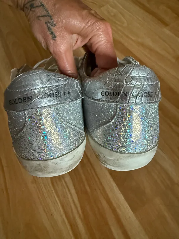 GOLDEN GOOSE Super-Star Iridescent and Glitter Leather Sneakers - Sz 38 - US 7 1/2 These are in good condition with light wear throughout. They are a pretty hard to find but super cute style. They have like holographic leather and glitter areas. Please see pics for details. Metallic leather upper Round toe Lace-up closure White leather star Cushioned insole; unlined Rubber sole Made in Italy - Image 10