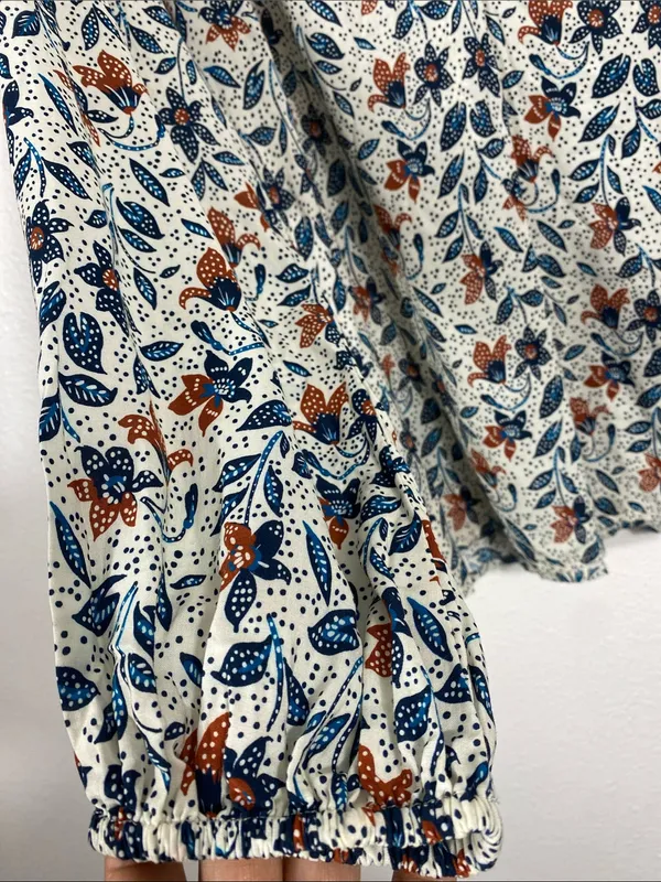 Velvet by Graham & Spencer White Floral V-Neck Blouse with Blue & Brown Accents - Image 4