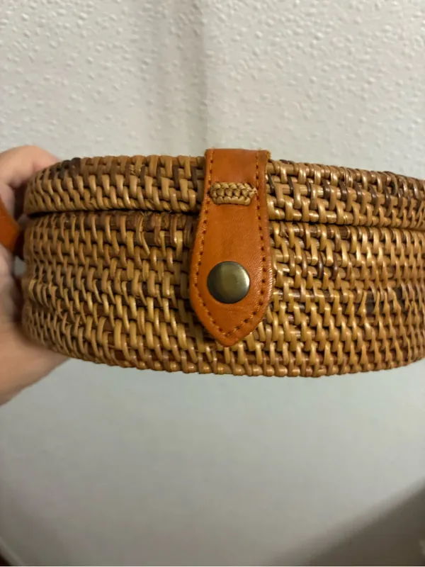 Round Woven RattanCrossbody Bag in Tan with leather strap & snap closure - Image 4