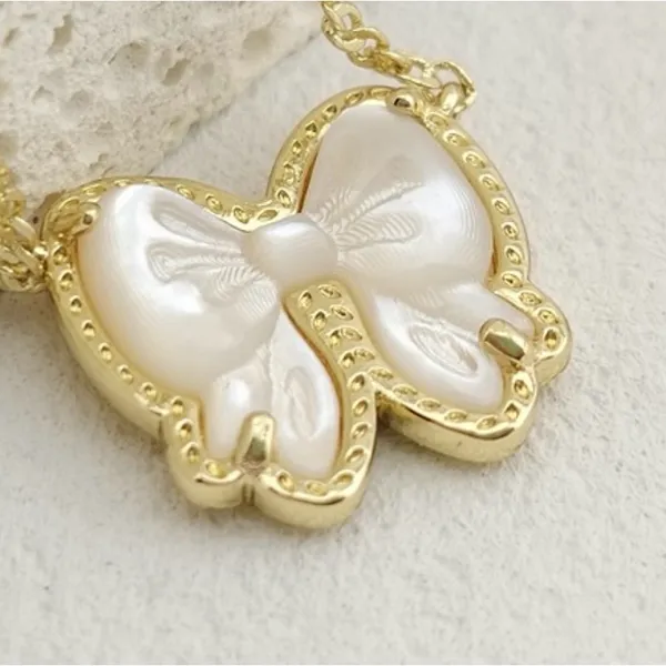 Kendra Scott Haley Bow Gold Short Pendant Necklace - Image 4