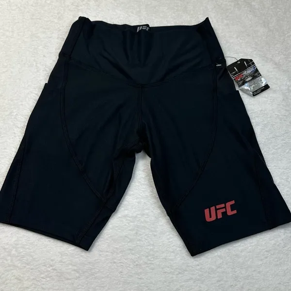 UFC Women's Black Bike Shorts with Red Logo and Side Pockets - Image 6