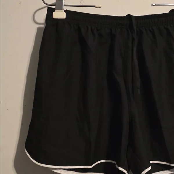 Nike Women's Black Athletic Mesh Shorts with White Trim - Image 8