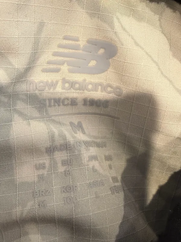 New Balance Cream Floral-Print Wind Breaker Jacket with Black Sleeve Panels - Image 8
