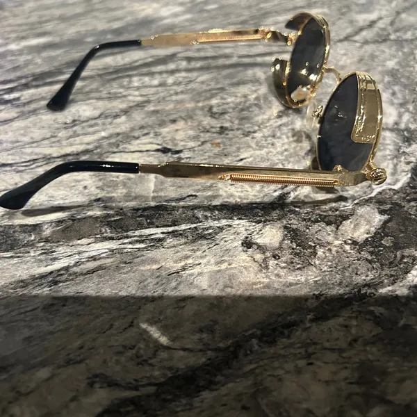 Round Gold and Black Sunglasses - Image 6