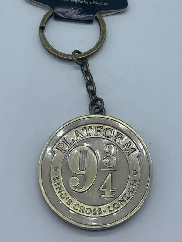 HARRY POTTER Hogwarts house crest and platform 9 3/4 keychain new in pac… - Image 7