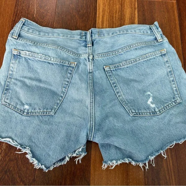 Agolde Faded Blue Frayed Jean Shorts - Image 2