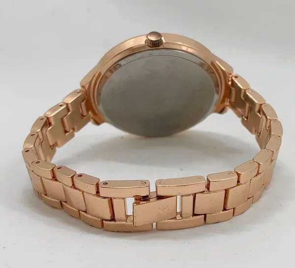 Ladies rose gold tone 40mm rhinestones MOP dial watch bracelet size 7.5” runs - Image 4