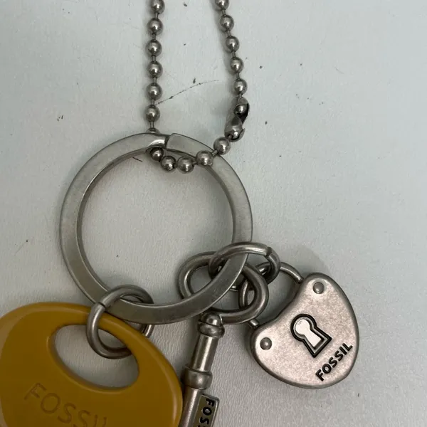 Vintage Fossil Keyper Key Charm Purse Hang Tag Fob Mustard Yellow Silver - Image 5