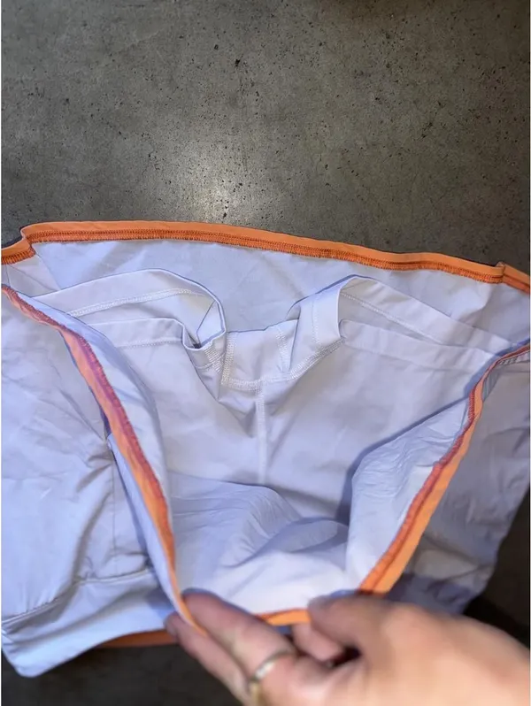 white and orange Brooks Chaser Skort - Image 3