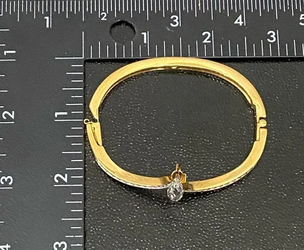 SWAROVSKI Vintage Signed Gold-tone Hinged V Bangle With Teardrop Crystal Charm - Image 10