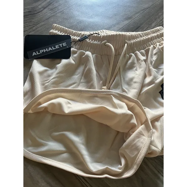 NEW Alphalete Woman’s Varsity Short - Tan ,size XS - Image 9