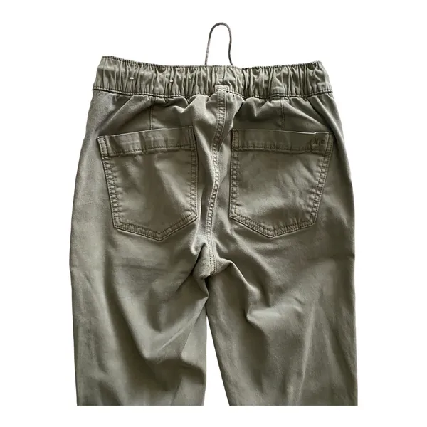 American Eagle -ARMY GREEN JOGGER PANTS-SIZE 2 Elastic waist with drawstring, zip front, two front and two back pockets, elastic ankles with a side zipper, excellent condition Measurements: Waist: side to side 13-16 inches Rise: 9 inches Inseam: 37 inches - Image 10
