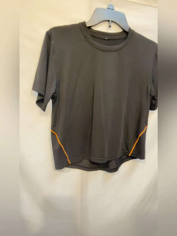 Lululemon Ventilated Open-Back Training T-Shirt in Black with Orange Soda trim - Image 5