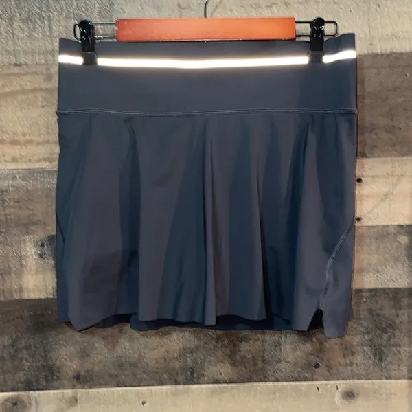 Athleta Ace Black Tennis Skort with silver reflective stripe on waistband - Image 3