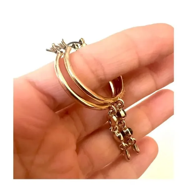 Gold tone hoop earrings with dangling rhinestones - Image 3