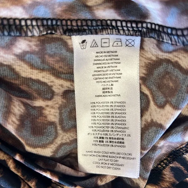 Michael Kors stretchy leopard pullover top w gold logo clasp NWOT - Image 10
