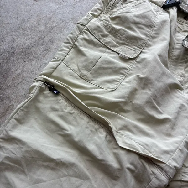 L.L. Bean convertible cargo hiking pants feature a built-in webbed belt and zip-off lower legs. - Image 2