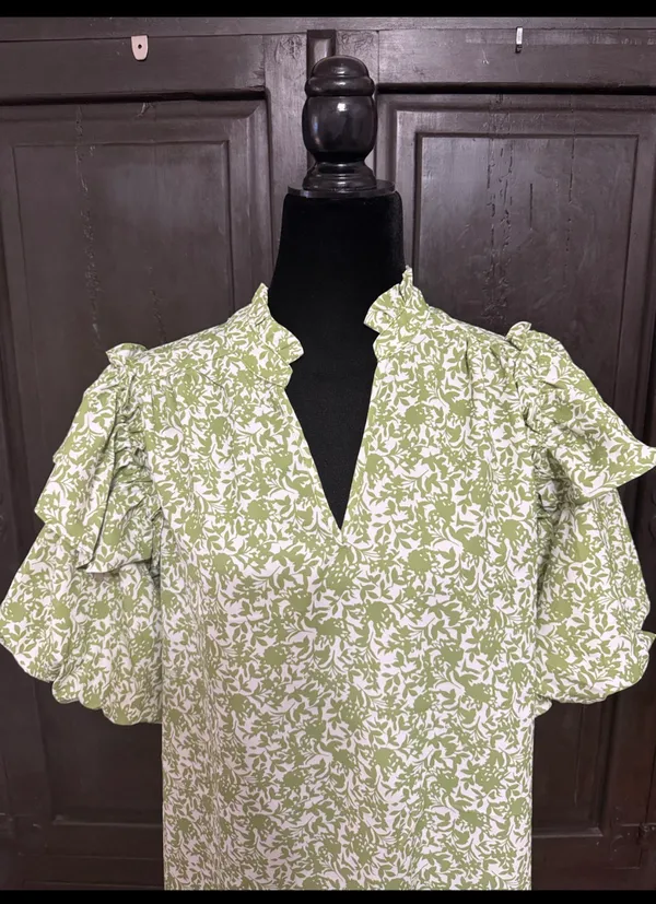 Green & white floral Boho Blouse with ruffled Puff sleeves- Size Medium. ***Refer to measurements. Gently warn and excellent condition. Measurements approximately 21” x 24” long. Material is 100% polyester. Non-smoking home . Priced at as is condition. Don’t like my price make a reasonable offer! And thank you for checking my closet! - Image 3