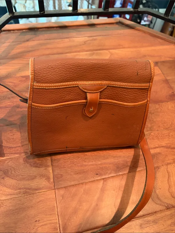 Dooney & Bourke Pebbled Leather Saddle Crossbody Bag - Image 9