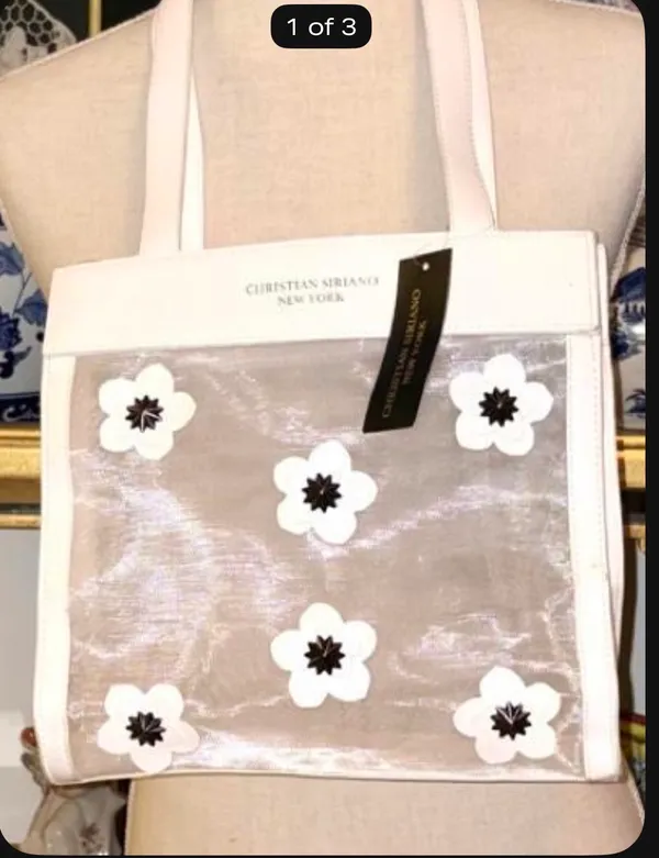 Christian Siriano's elegant translucent mesh tote bag stands out for its delicate black and white floral appliqués. - Image 4