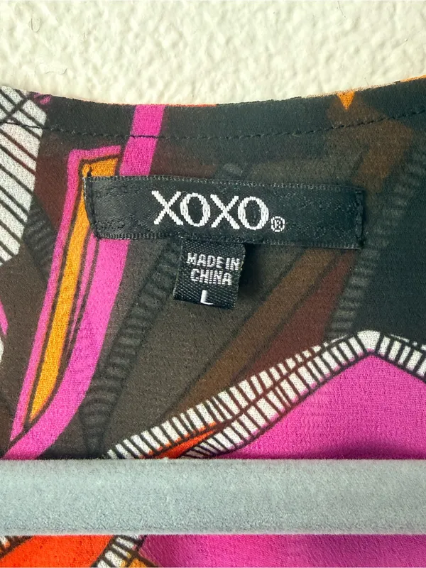 XOXO Black Mini Romper with Orange & Purple Geometric Print - Image 3