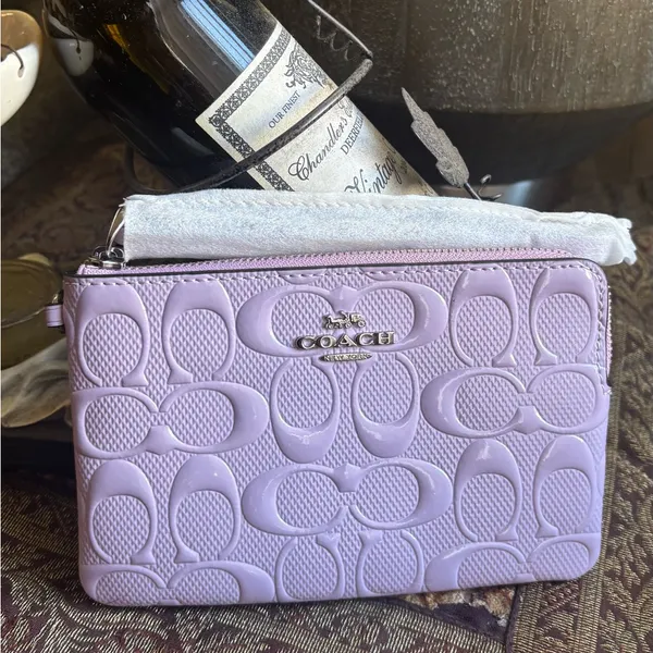 Authentic COACH patent signature leather zip top wristlet with a heart charm - Image 2