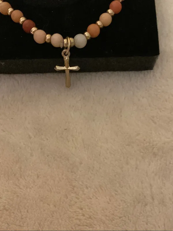 Neutral Multi-Bead Stretch Bracelet with Gold Cross Charm - Image 2