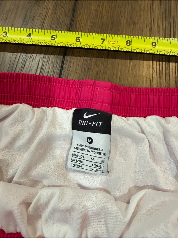 Mercer Nike Women's Hot Pink Running Shorts with White Trim - Image 4