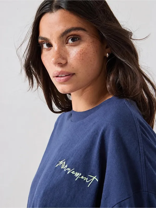 SOLD OUT Free People Movement Tackle Logo Tee Size Large NWT Urban Buti Navy - Image 3