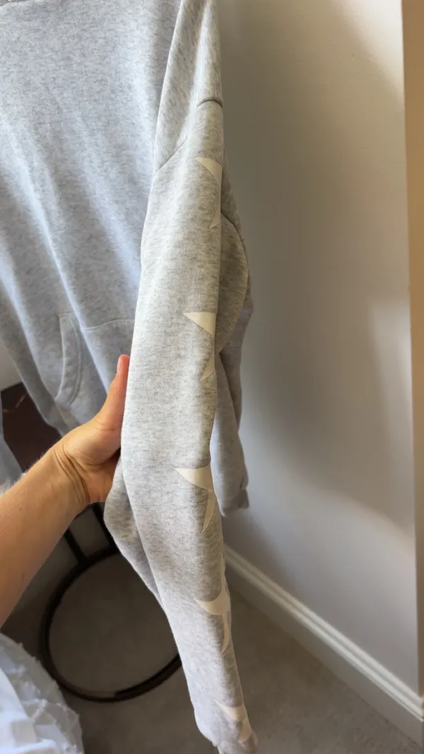 Gray Starfit hoodie with white star pattern on sleeves size medium - Image 3