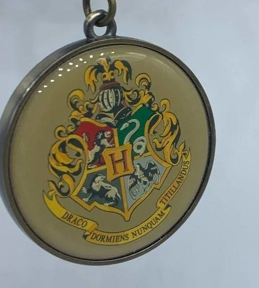 HARRY POTTER Hogwarts house crest and platform 9 3/4 keychain new in pac… - Image 2