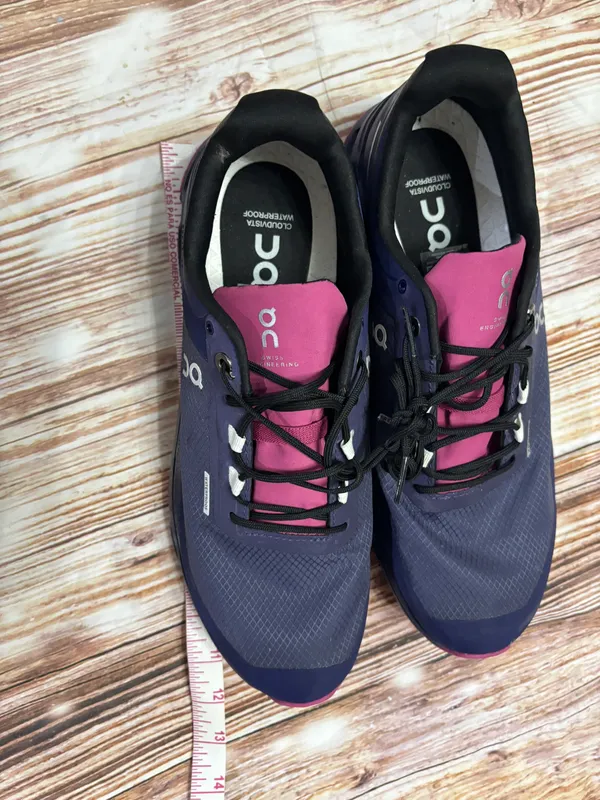 On | Cloudvista Waterproof Trail Running Shoe (Women) |10 Waterproof: protects against rain, puddles and slush to keep feet dry in wet conditions Trail: provides superior stability and traction on hills, uneven surfaces and changing terrain Lightweight: puts cushioning and performance underfoot with an emphasis on streamlined comfort Removable, cushioned insole allows for custom orthotics Helion™ superfoam cushioning delivers lightweight energy return even in hot and cold temperatures CloudTec® sole provides a smooth ride that moves naturally with each stride Missiongrip™ multidirectional lugs in the tread maintain superior grip on changing terrain Synthetic and textile upper/textile lining/rubber sole - Image 5