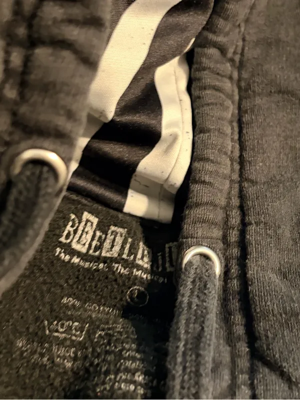 Black Zip Hoodie with Striped Hood Lining and Small Chest Logo - Image 4