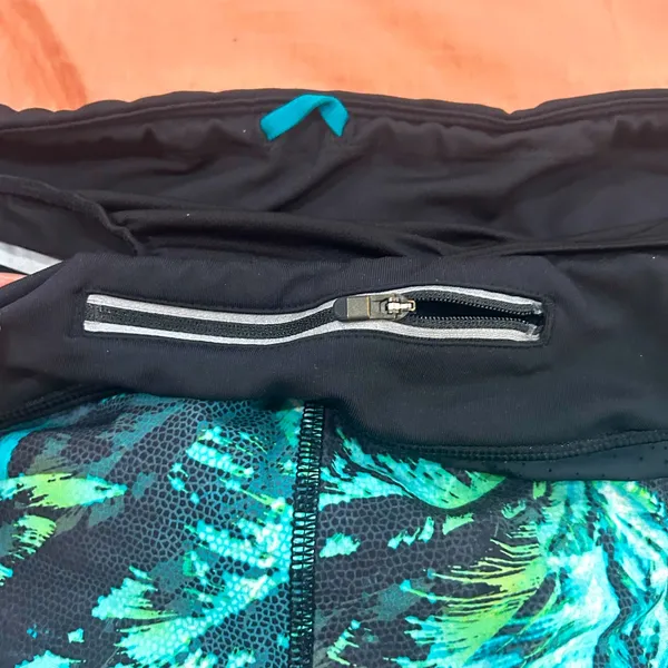 Athleta Black and Green Athletic Shorts Moisture-Wicking Relaxed Fit - Image 3