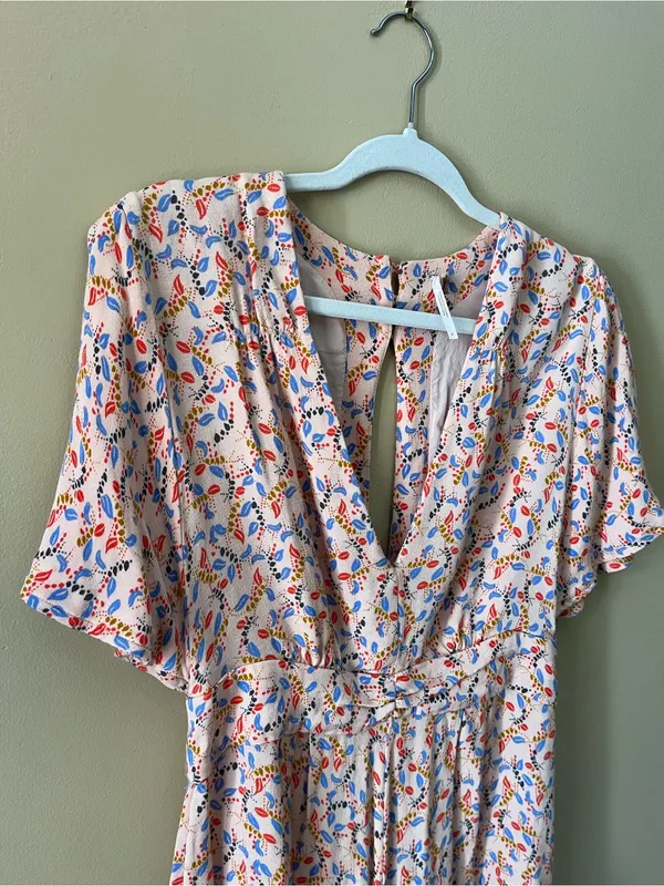 Free People Blush Pink Floral Print Romper with Blue & Red Accents - Image 2