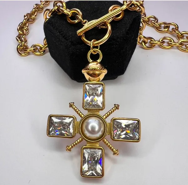 Chunky gold cross necklace with pearl and toggle clasp - Image 3