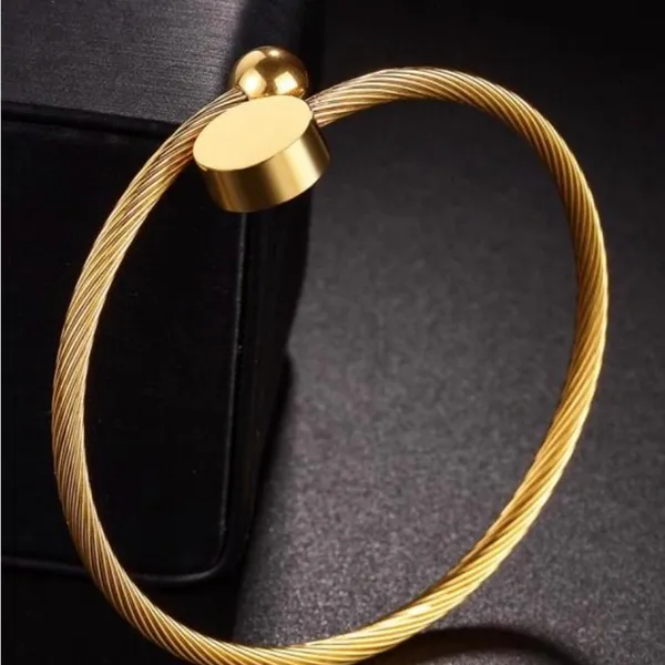 Elegant Gold-Tone Bangle Bracelet stainless steel NWOT One size fits all - Image 2