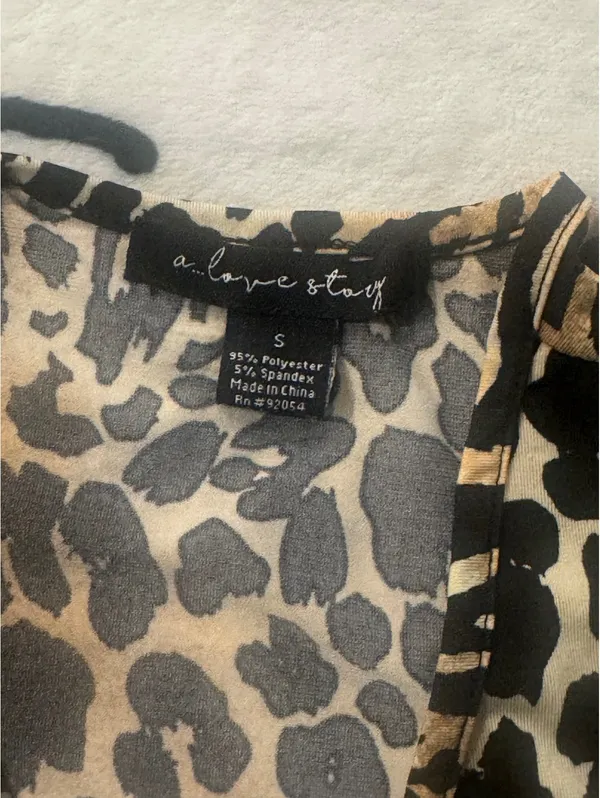 Modern animal-print bodysuit with a wrap neckline by "a... love story," size S - Image 6