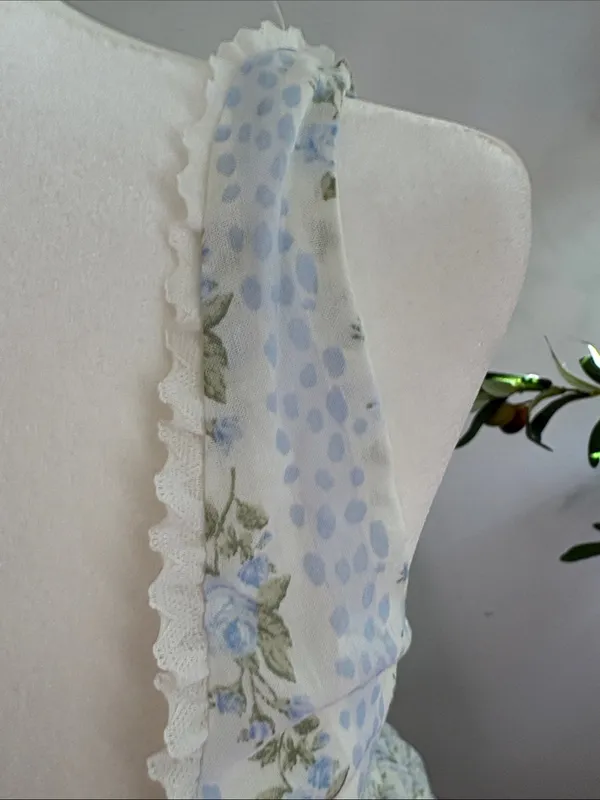 Vintage-Inspired Blue Floral Mini Dress with Cream Trim - Image 4