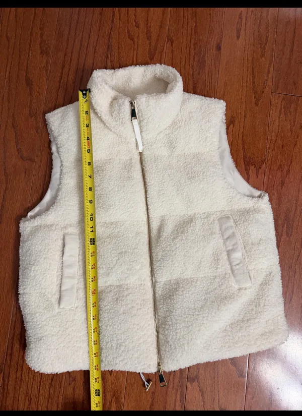 SHEIN Cream sherpa fleece fluffy puffer Zip up Vest with bag - size Medium. ***refer to measurements for size. Gently Warn and excellent condition. Measurements approximately from armpit to armpit 21” not fully stretched out x 22” long. Non-smoking home. Priced at as is condition. Don’t like my price make a reasonable offer! And thank you for checking my closet! - Image 8